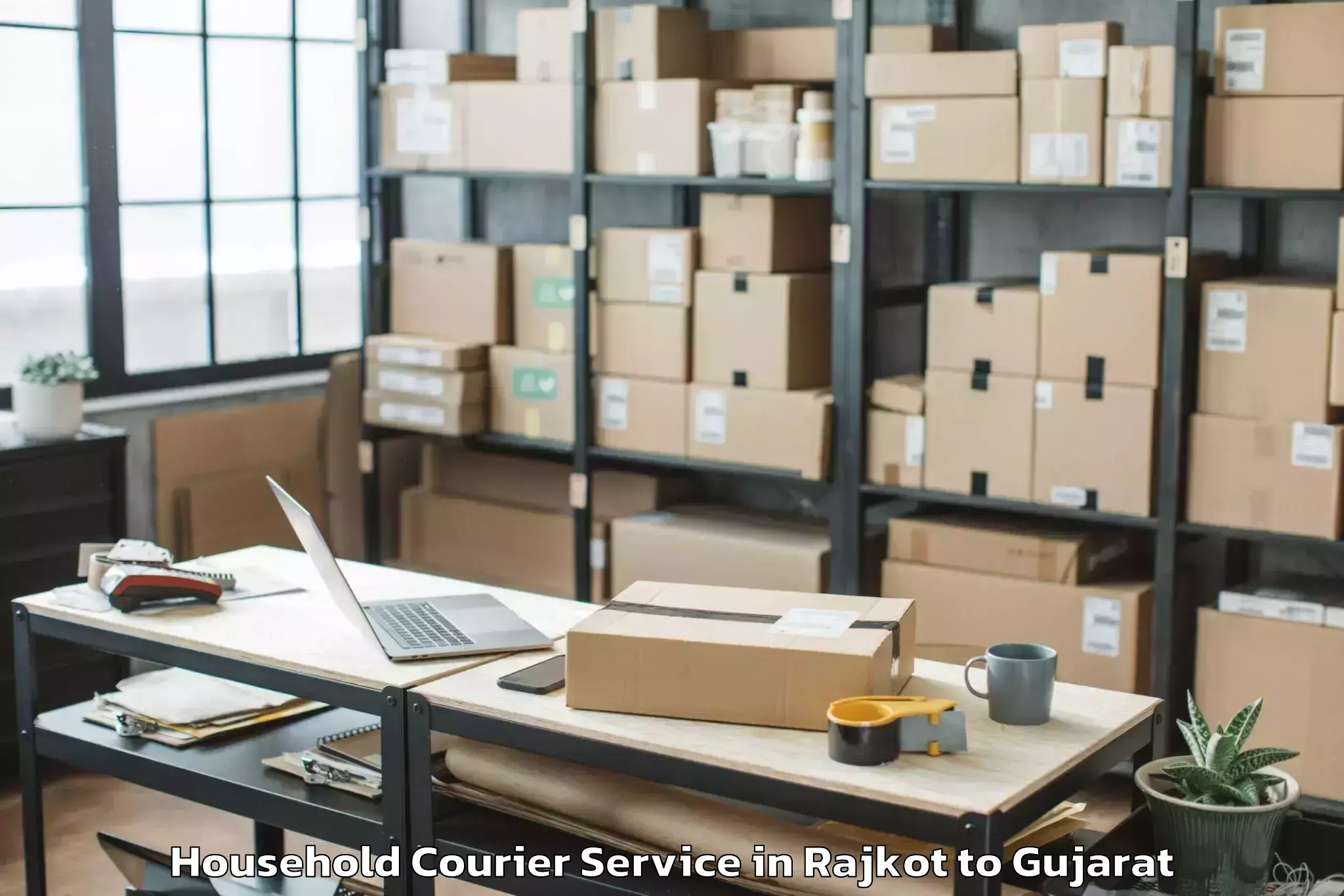 Reliable Rajkot to Kadi Sarva Vishwavidyalaya Gan Household Courier